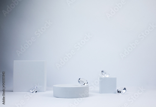 Set of white cosmetic bottles mockup. White plastic bottles with shampoo and conditioner and shower gel on a white background. Mockup cosmetic bottle with crystals on white background