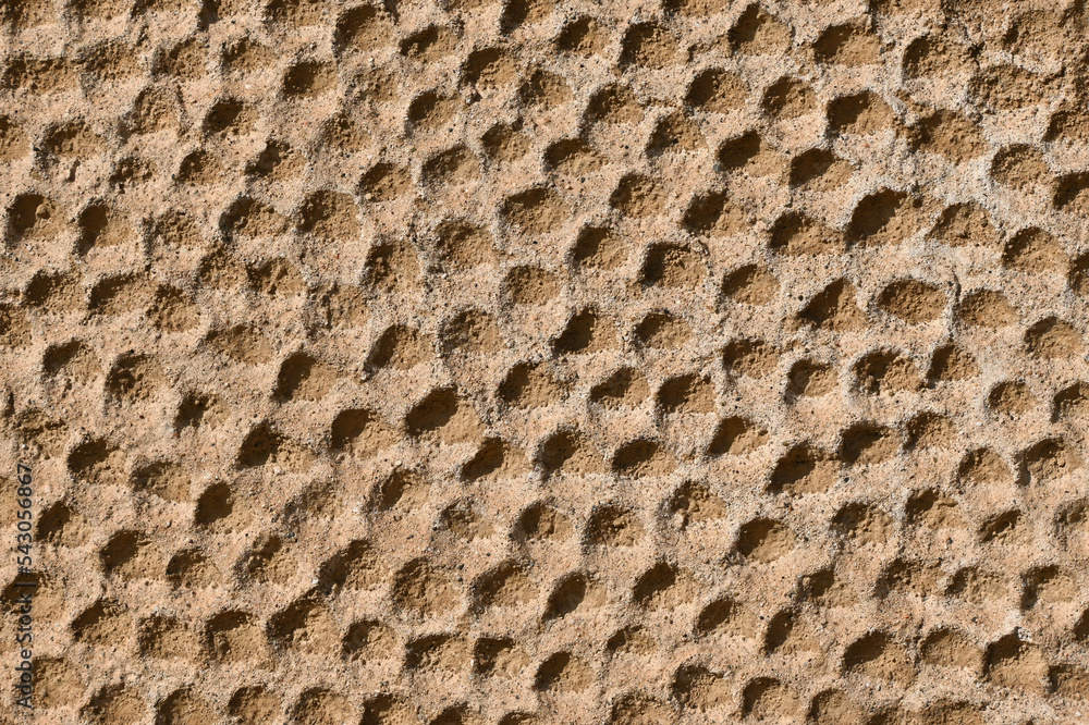 Fondo con detalle y textura de superficie con huecos aleatorios y degradado de tonos marrones Fondo con detalle y textura de superficie con huecos aleatorios y degradado de tonos marrones