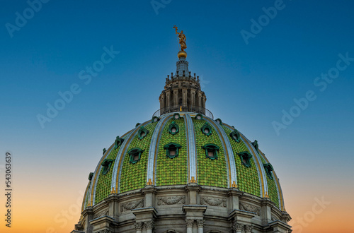 Detail of the tiling and statue on the dome of the Pennsylvania State Capitol building in Harrisburg PA photo