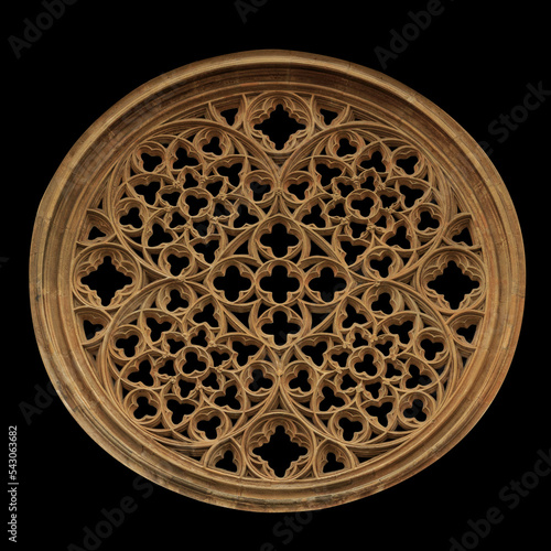 Decorative exterior detail of gothic architecture. Isolated on black background.