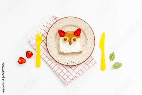 Funny kids sandwich fox face - toast bread with peanut butter and strawberries