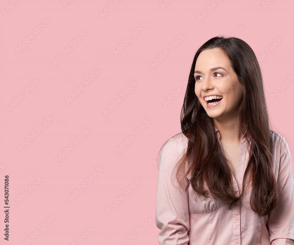 Young woman feeling happy and posing with a big smile Young woman feeling happy and posing with a big smile