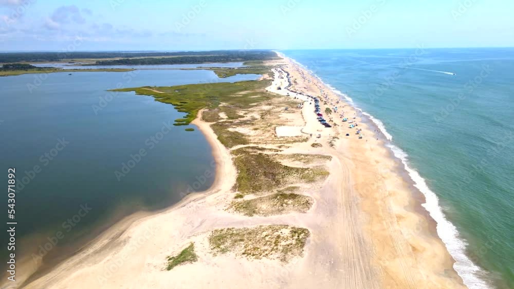 Top down view of the beach on Chincoteague Island Virginia. car parking on the beach along the