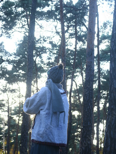 a woman is wandering alone in the forest 3