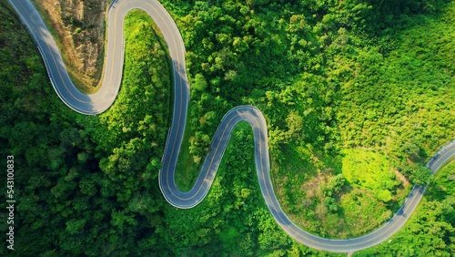 Aerial view over the winding mountain road 