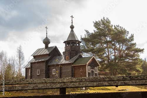 Rural wooden orthodox Christian temple. Temple of Cassian the Greek	. photo