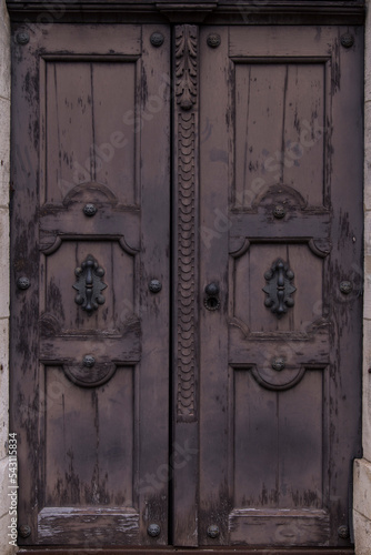 Germany - December 20,2021: Old Decorative Main Entrance Wooden Door.