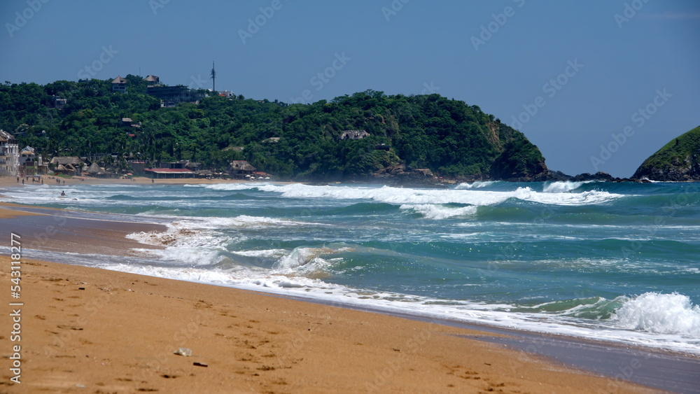Waves breaking on the beach in Zipolite, Mexico Waves breaking on the beach in Zipolite, Mexico