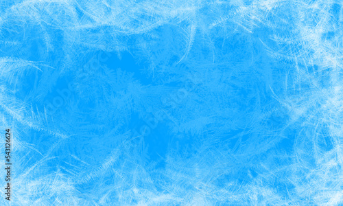Abstract ice background. Blue background with cracks on the ice surface. 