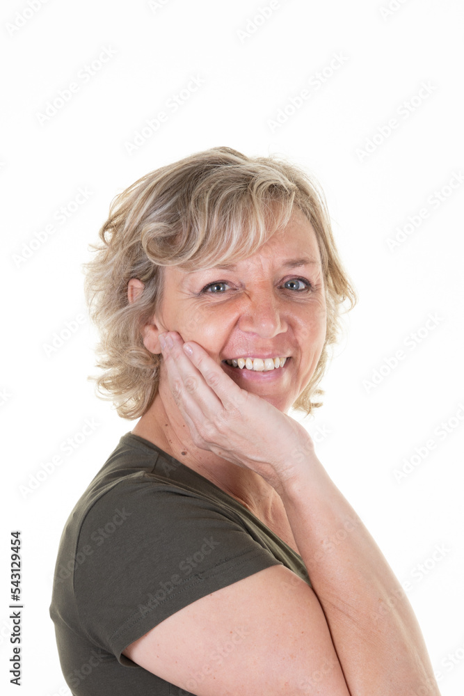 portrait senior woman smiling looking cute smile posing in white wall background portrait senior woman smiling looking cute smile posing in white wall background
