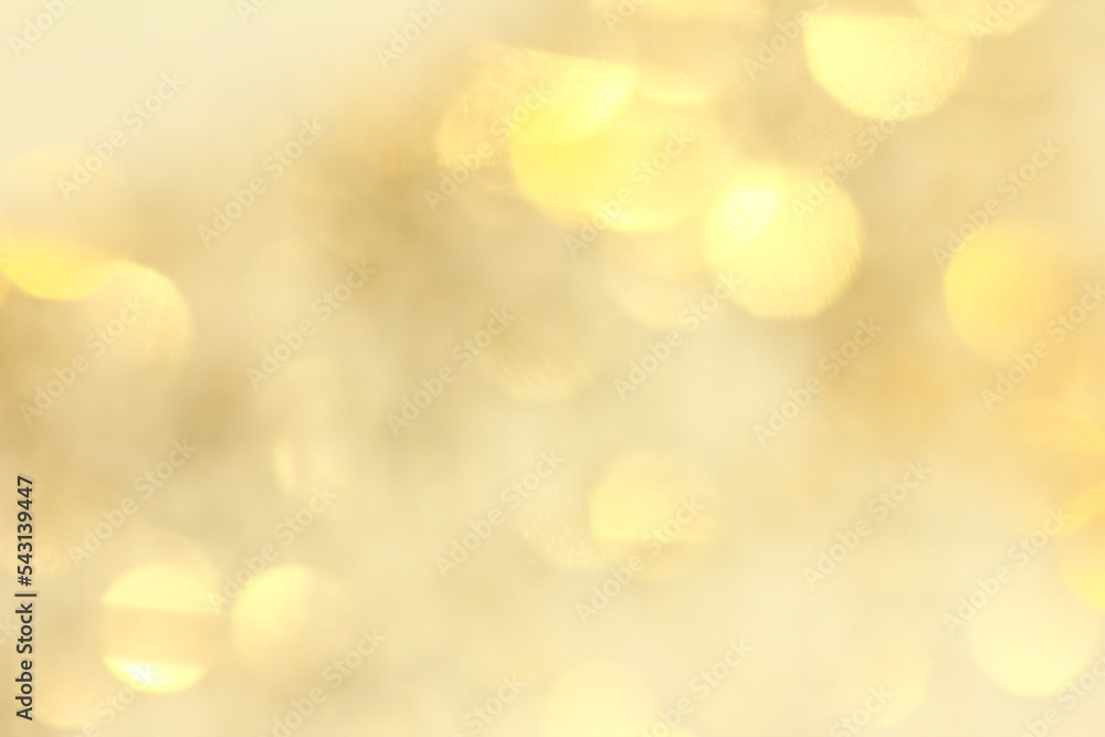 Abstract background with large golden sparkling bokeh. Abstract background with large golden sparkling bokeh.