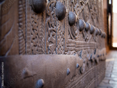 The ancient elm gate from the Ark Fortress in Khiva. photo