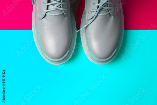 beige women's shoes on a colorful background. Autumn shoes. Horizontal image