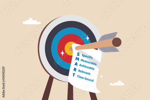 Setting SMART goal, acronym with specific, measurable, achievable, relevant and time, planning for realistic target concept, arrow bow hit bullseye with note paper written business SMART goal.