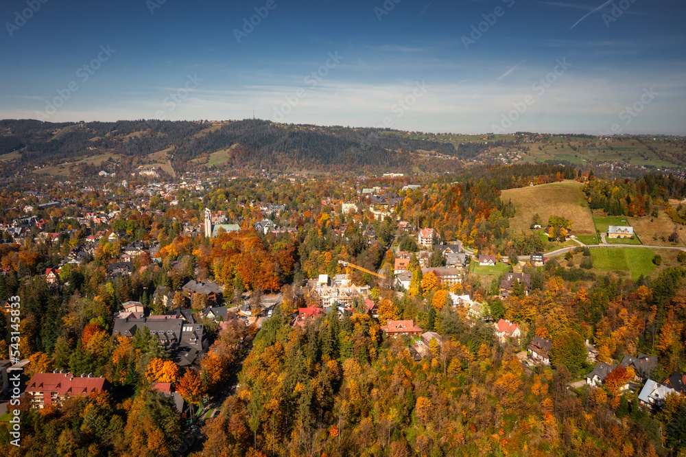 Aerial view of the Zakopane town uder Tatra mountains at autumn. Poland