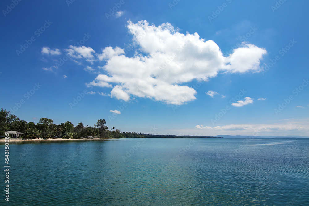 Travel island beach with transparent clear sea water with cloud and blue sky background landscape in Thailand