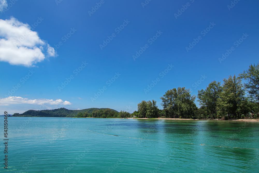 Travel island beach with transparent clear sea water with cloud and blue sky background landscape in Thailand Travel island beach with transparent clear sea water with cloud and blue sky background landscape in Thailand