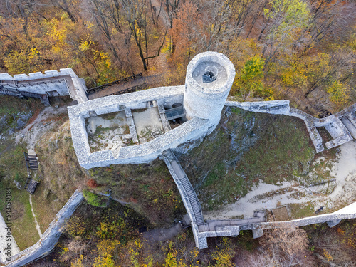 Obraz na płótnie Castle ruins from a drone. View from above, photo from a drone. The castle in the forest. w salonie