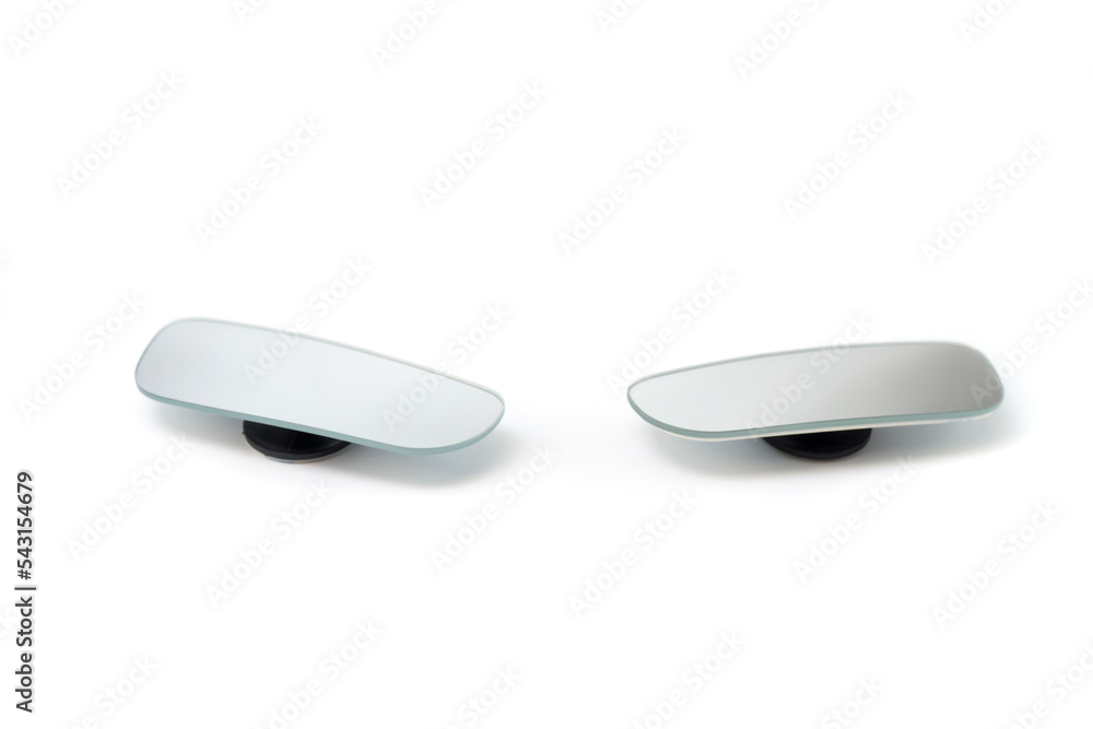 Car Blind Spot Mirror is an additional glass that is attached to the near side of the car's rearview mirror and can reach a wider view isolated on a white background. Car Blind Spot Mirror is an additional glass that is attached to the near side of the car's rearview mirror and can reach a wider view isolated on a white background.
