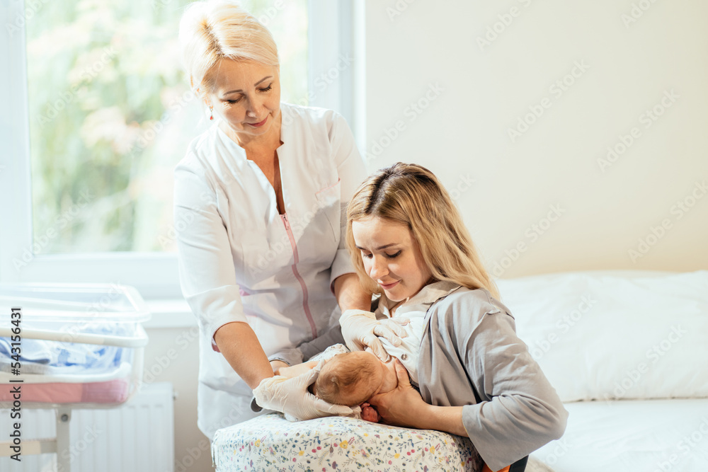A lactation consultant helping a new mother with a breast pump