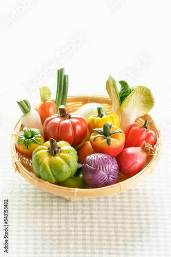 miniature fresh vegetables in basket