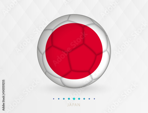 Football ball with Japan flag pattern, soccer ball with flag of Japan national team. photo