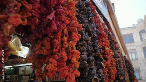 Dry eggplant, bell chili, vegetables hanging on sale at market Grand Bazar, Istanbul Turkey. photo