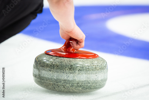 Curling rock on the ice 