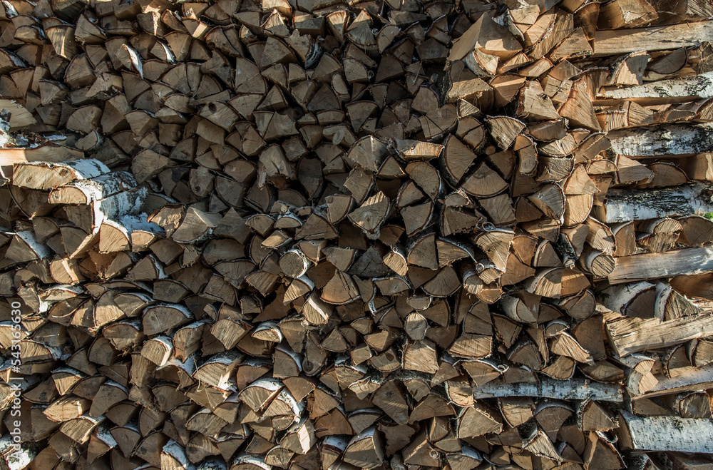 Stocks of firewood for the winter. cold winter Stocks of firewood for the winter. cold winter