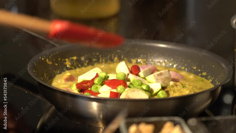 green curry spices Thai Food were fried with coconut milk in pan before being boiled in the pot. green curry spices Thai Food were fried with coconut milk in pan before being boiled in the pot.