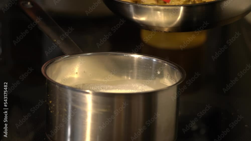 green curry spices Thai Food were fried with coconut milk in pan before being boiled in the pot. green curry spices Thai Food were fried with coconut milk in pan before being boiled in the pot.