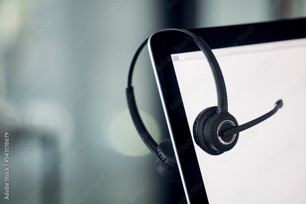 Call center, laptop screen and headset Laptop in modern office for ...