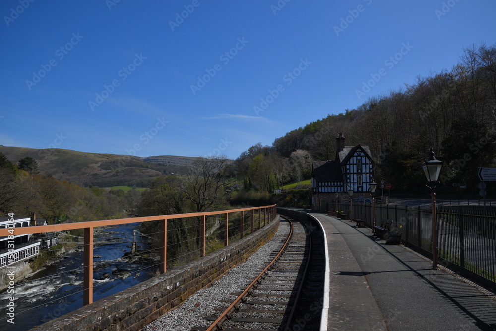 the unique train station of Berwyn in wales, which is a station that is on top of a bridge that goes over another bridge 