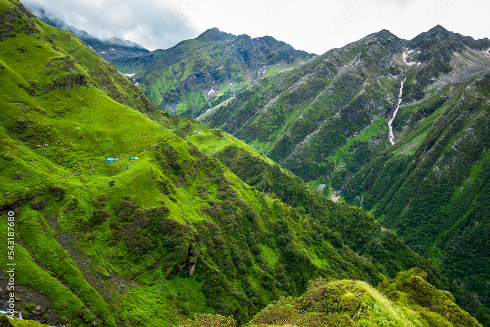 Obraz premium Beautiful mountains peaks and waterfalls in the background. Shrikhand Mahadev Kailash Himalaya Yatra. Himachal Pradesh India.