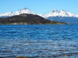 Beautiful landscape of a lake with snowy mountains in the background
