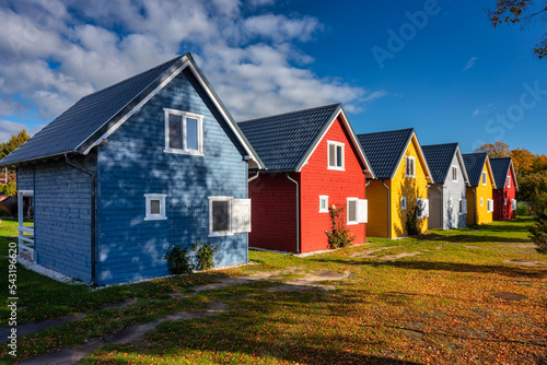 Colorful Scandinavian houses in an autumn scenery. Poland