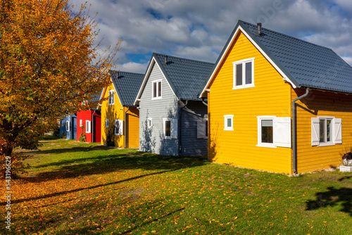 Colorful Scandinavian houses in an autumn scenery. Poland photo