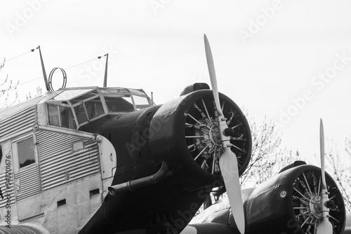 Cockpit and mid-engine of a three-engine old Junkers JU52 transport and traffic plane also called Tante Ju photo
