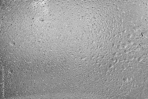 Condensation on the window. Wet surface. Raindrops.