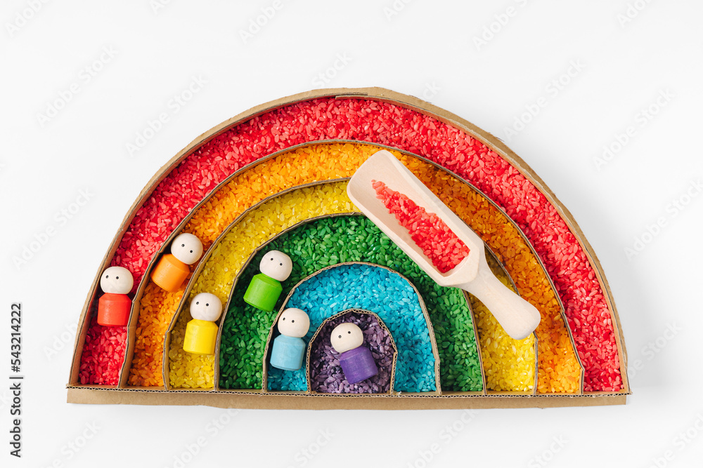 rainbow-filled-with-bright-colored-rice-sensory-bin-for-busy-toddler