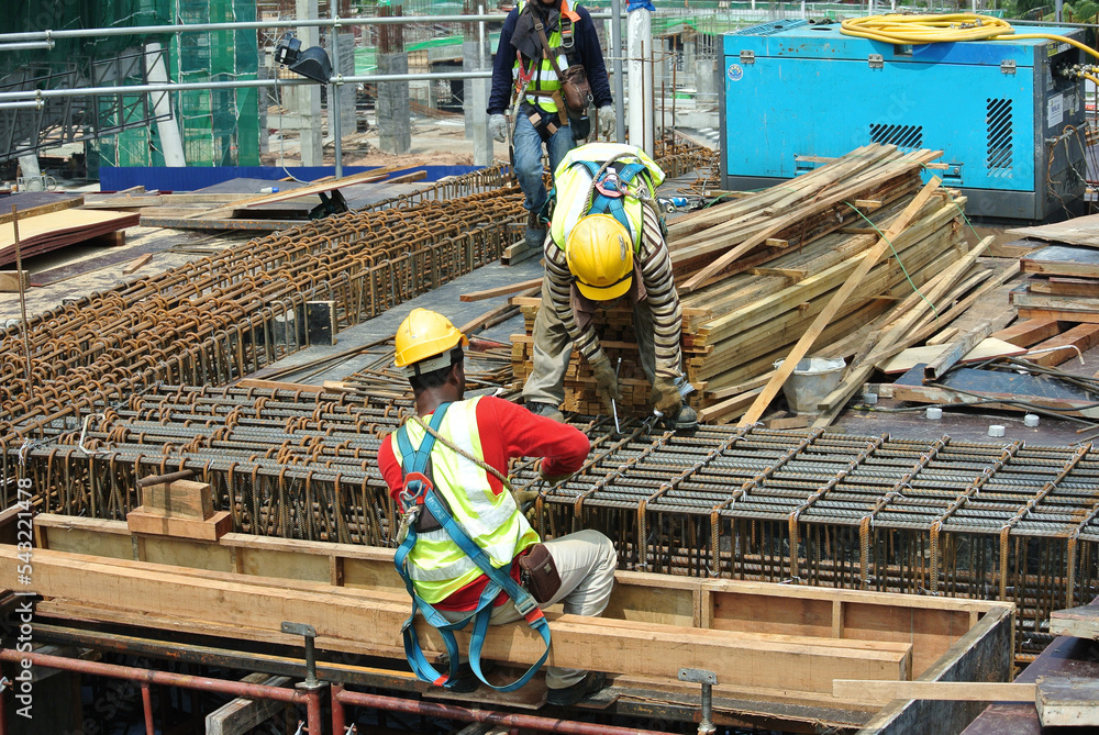 Naklejka MALACCA, MALAYSIA MARCH 30, 2016 Construction workers