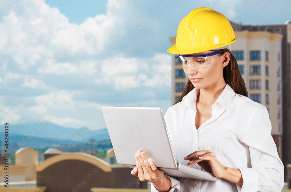 Young female engineer controls operation at work Young female engineer controls operation at work
