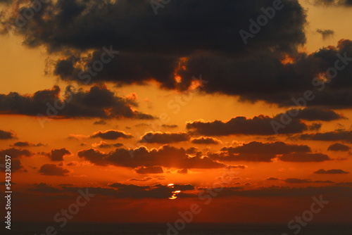 The sun sets below the horizon on the Mediterranean Sea in northern Israel. © shimon