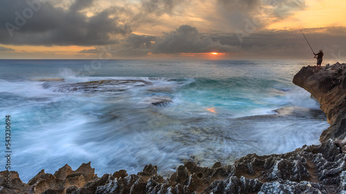 The Fisherman on the rocks at the tidal pool near Arniston