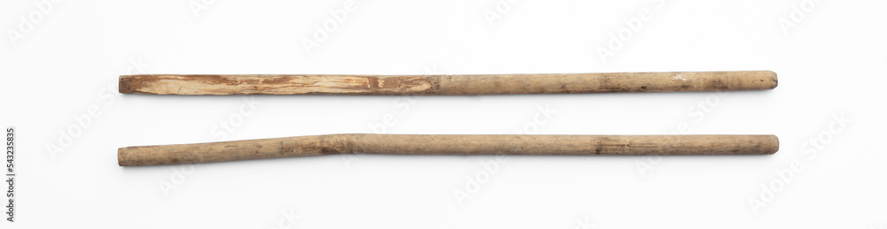 two simple wooden long stick isolated on white background two simple wooden long stick isolated on white background