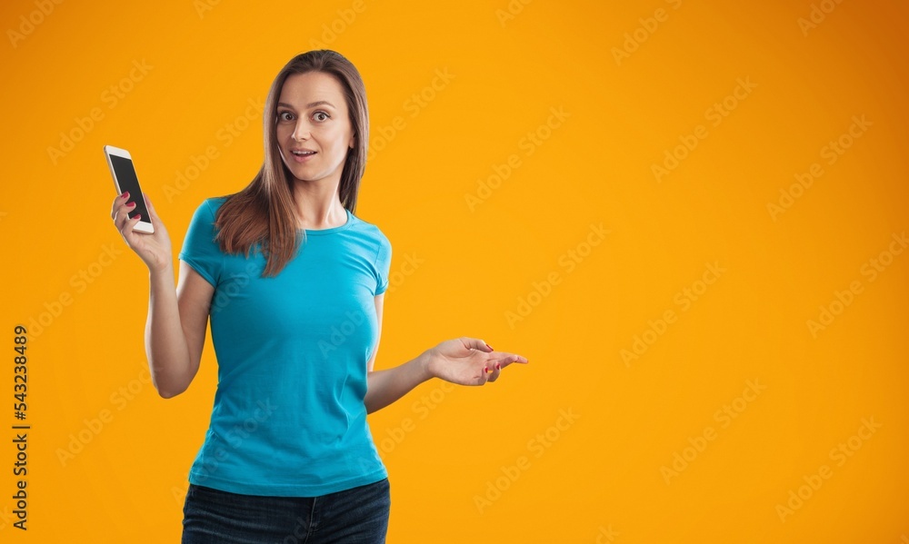 Surprised woman hold modern smartphone Surprised woman hold modern smartphone