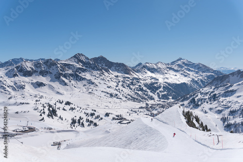 Ski resort in Austria alps, Obertauern are one of the best place for skiing and snowboarding. Winter landscape full of snow and gorgeous slopes. 