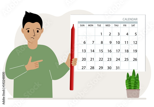 A man with a pencil in his hand creates a calendar. Planning and time management, responsible employee plans meetings and events.