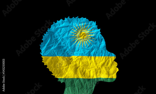 African woman silhouette with Rwanda national flag.