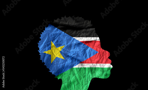 African woman silhouette with South  Sudan national flag.